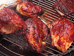 Marinated chicken on a barbecue Chicken BBQ.jpg