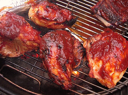 Marinated chicken on a barbecue