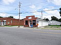 Clover Post Office, located at 101 South Main St, Clover, Virginia. West (front) and south sides of building shown.