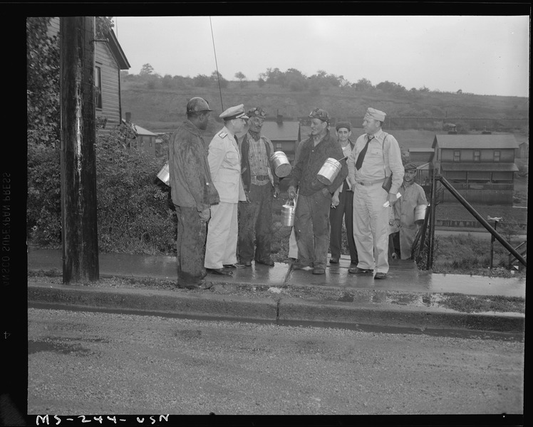 File:Commodore Dickman and Commander Amberson talking with miners who are returning home from work. H. C. Frick Coke... - NARA - 540331.tif