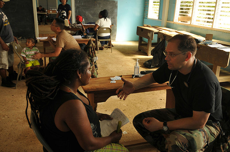 File:Consulting with a patient DVIDS130395.jpg
