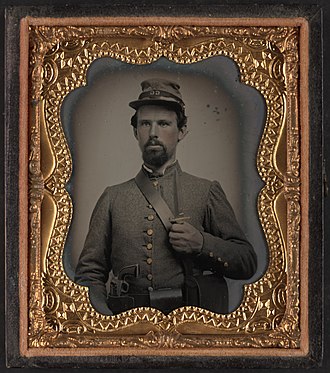 Corporal Edward Lindsey Clarke of Co. F, 23rd Virginia Infantry Regiment Corporal Edward Lindsey Clarke of Co. F, 23rd Virginia Infantry Regiment in uniform with revolver and dagger LCCN2016652805.jpg