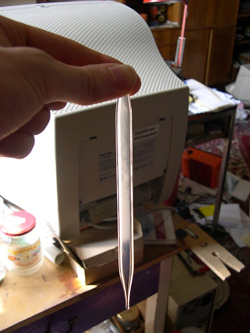 Critical carbon dioxide exuding fog while cooling from supercritical to critical temperature.