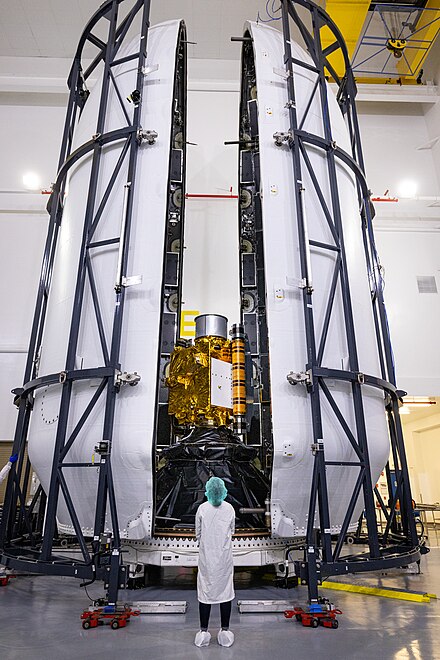 Falcon 9 rocket's payload fairing being attached to NASA's Double Asteroid Redirection Test (DART) spacecraft on 16 November 2021