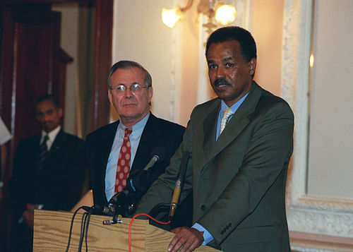 Isaias Afwerki (right), the rebel-leader-turned-president who has ruled Eritrea as a totalitarian dictator since the 1990s[59]