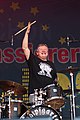 German Punkrock group Die Kassierer’s drummer Volker Kampfgarten (Drums) standing behind his drum set during a live performance at Bochum Total (2016), HEINZ-Bühne, Bochum (DEU) /// leokr.de for Wikimedia Commons