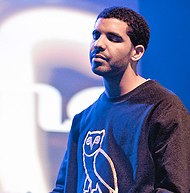 Critics noted that the "gloominess" of Dark Lane Demo Tapes is similar to Drake's second album Take Care (2011). Drake in 2011.jpg