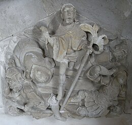 Easter Sepulchre, Holcombe Burnell Church, Devon. Detail of central sculpted relief showing Christ stepping out of the tomb, with sleeping guards EasterSepulchreHolcombeBurnellDevonDetail.JPG