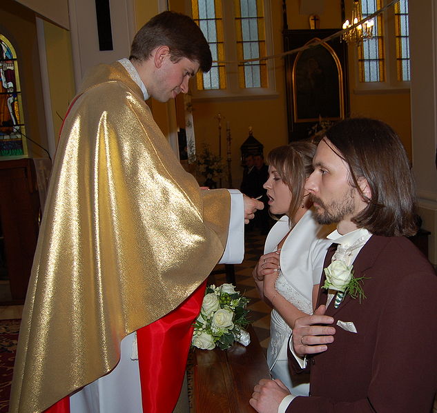 File:Ejdzej and Iric wedding communion-01.jpg