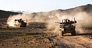 ASLAV-25 and personnel carrier upgraded to counter IED threat in Afghanistan, 2011.