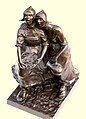 Garotas de Volendam, uma escultura em bronze de Gregor von Bochmann do início do século XX retratando a típica vestimenta neerlandesa