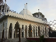 The dargah of Azan Faqir, a Sufi saint who helped spread Islam in the region. Hajarat Ajan Pir Dargaah, Horaguri Chapori, Sivasagar..jpg