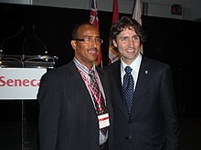 Journalist Hassan Abdillahi of Ogaal Radio with then MP Justin Trudeau at Seneca College (2009). Hassan Abdillahi and Justin Trudeau.jpg