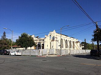 The original church building after the fire Holy Cross Church, San Jose, California, at corner before demolition.jpg