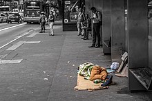 Homeless and poor man sleeping on the street. Homeless sleeping on Paulista Avenue, Sao Paulo city, Brazil.jpg