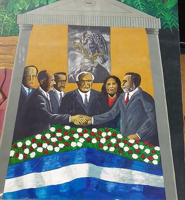 Mural of the peace agreement located on the national museum in San Salvador; in the image the guerilla leader Schafik Handal leader of the FMLN and th
