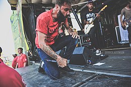 Singer of letlive. Jason Aalon Butler performing at Warped Tour 2013. Aalon Butler has been praised as the key force behind for letlive.'s chaotic and primal live performances. Jason Aalon Butler Warped 2013.jpg