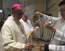 Bishop Mangalinao preparing incense for Mass Jose Elmer Imas Mangalinao1.jpg