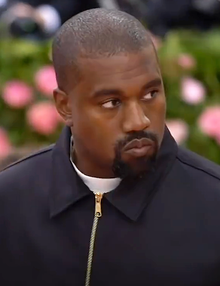 Aware of this media label, Madonna called Kanye West (pictured) as either the "new" or "Black Madonna" Kanye West at the Met Gala in 2019.png