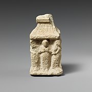 A complex Cypriot figure exhibiting pose