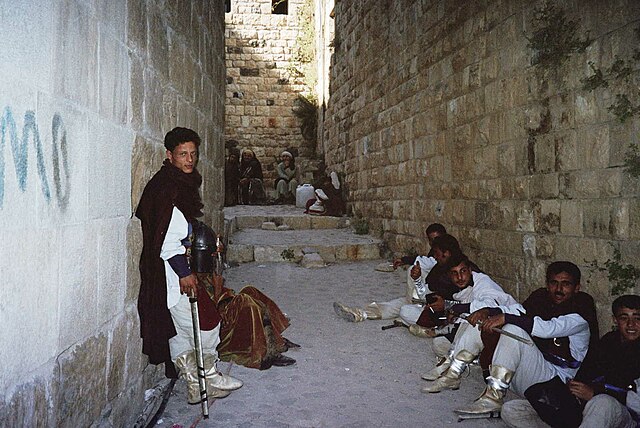 Background actors in the Krak des Chevaliers castle, Syria.