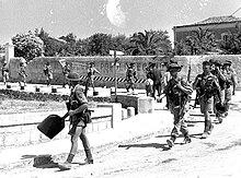 Members of the Loyal Edmonton Regiment enter Modica, Sicily, 1943 Loyal Edmonton Regiment soldiers entering Modica Sicily July 1943.jpg