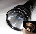 Closeup view of a 4D Maglite with the factory-installed Luxeon LED module. The inset shows the LED module with the reflector assembly removed.