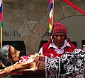 Man in folk clothes in religious ceremony. Cusco, Peru