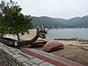 Dragon Boat on the beach at Silver Mine Bay, Mui Wo, Lantau Island, Hong Kong