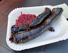 Mustamakkara ("black sausage"), a speciality food from Tampere, is typically consumed with lingonberry jam Mustamakkara2019.jpg