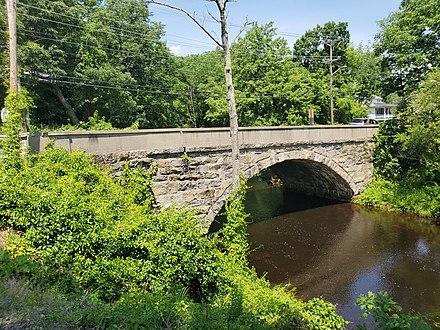 Stone arch bridge that carries Route 7 over the river in Nasonville