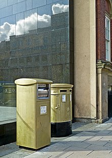 Postboxes on Cookridge Street in Leeds painted gold in honour of Adams' Olympic Gold medal win. Nicola Adams' gold post box in Leeds (Taken by Flickr user 11th September 2012).jpg