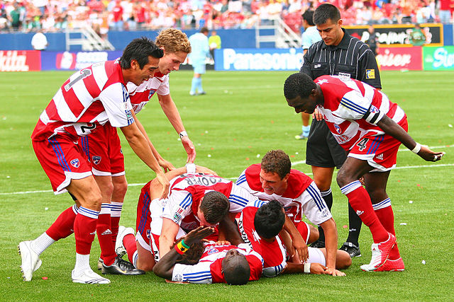 FC Dallas players celebrating a goal scored by Dominic Oduro in a match against Colorado, 2007