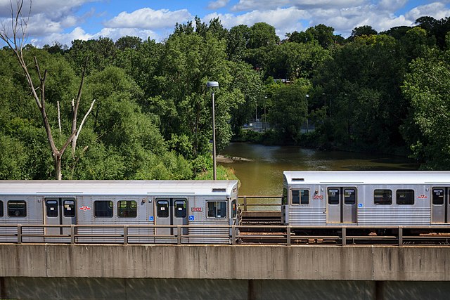 Trains crossing the Humber River near Old Mill station
