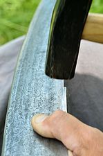 Peening of a scythe blade