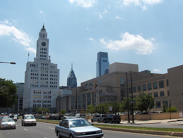 The Philadelphia Board of Education Building, the district's headquarters, at 440 North Broad Street (in the right foreground)