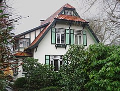 This is a photograph of an architectural monument. Wohnhaus im Heimatstil Oeltingsallee 3 Baujahr: 1911