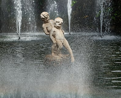 Statue of two boys, pond of the Jardim Municipal do Funchal, Funchal, Madeira