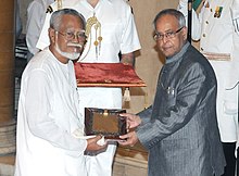 Pranab Mukherjee presenting the Sangeet Natak Akademi Fellowship to Shri Heisnam Kanhailal, at the investiture ceremony of the Sangeet Natak Akademi Fellowships and Sangeet Natak Akademi Awards-2011, at Rashtrapati Bhavan.jpg