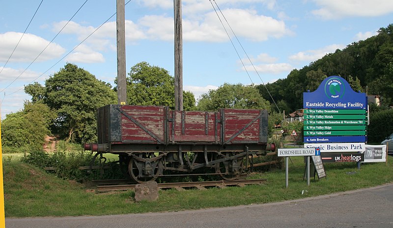 File:Preserved wagon close to the trackbed of Hereford-Ross on Wye branch at Rotherwas, the track is on the sandy bank behind it.jpg