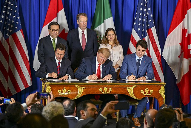 Enrique Peña Nieto, Donald Trump, and Justin Trudeau sign the Canada–United States–Mexico Agreement during the G20 summit in Buenos Aires, Argentina, 