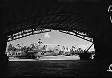 A Consolidated Liberator GR Mark V of No. 111 (Coastal) Operational Training Unit undergoes a routine service at Oakes Field, Nassau, Bahamas Royal Air Force Coastal Command, 1939-1945. CH14622.jpg