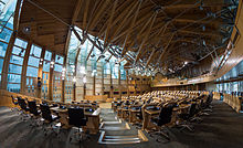 The Scottish Parliament, the national legislature of Scotland Scottish Parliament Debating Chamber 1.jpg