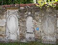 Individual features of the entity: Church, war memorial (First World War), memorial stone / tomb Second World War (Voigt), retaining wall and staircase to the cemetery with three baroque tombs, three hereditary burials and cemetery enclosure (see also entity document for object 09303748, same address)