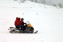 Snowmobile riders enjoying themselves at the 5th National Winter Games at Gulmarg, Kashmir in 2008. Snowmobile raiders enjoying at the 5th National Winter Games at Gulmarg, Kashmir on February 22, 2008.jpg