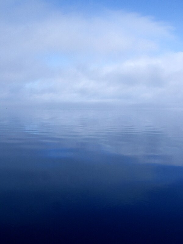 Invisible water vapor condenses to form visible clouds of liquid rain droplets