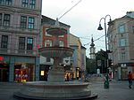 Suihkulähde Taubenmarkt "Sparkassenbrunnen"