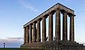 Tourists posing at the National Monument of Scotland.jpg