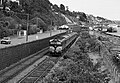 Ausfahrender Zug mit Diesellokomotive der 001 Class (1987)