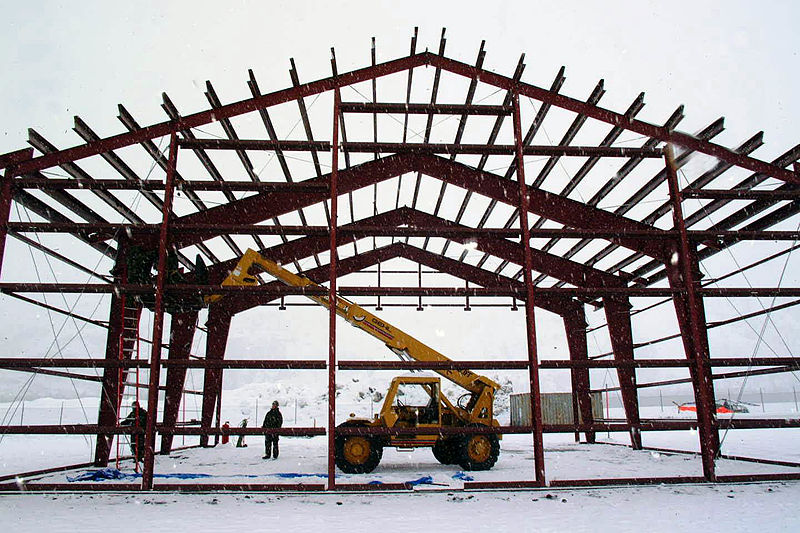 File:US Navy 030302-A-8380W-003 Seabees build hangar.jpg